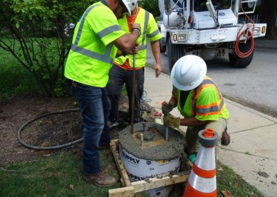 5g fiber pole build concrete